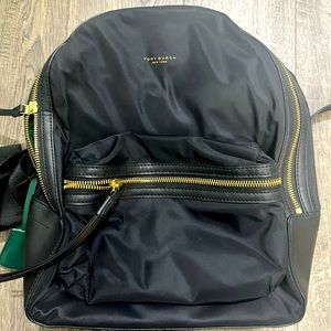 Tory Burch backpack, nylon with leather handle and bottom. 12x5x12
